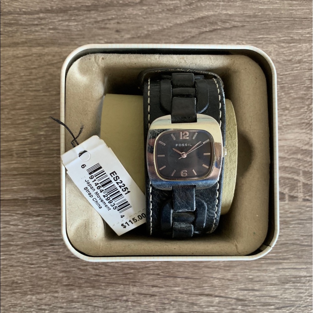 Black leather Fossil watch with a black watch face